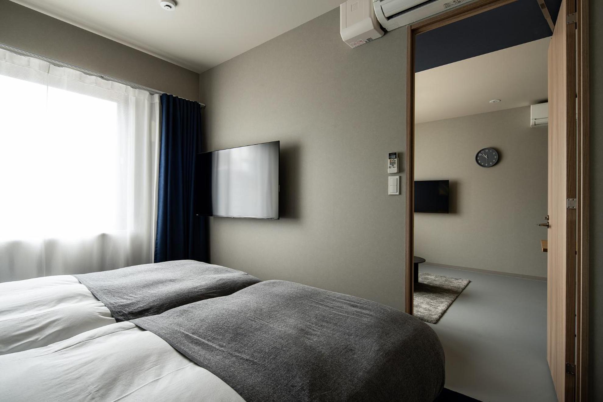 Section L Tsukiji Lejlighedshotel Tokyo Værelse billede